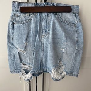 Distressed jean mini skirt